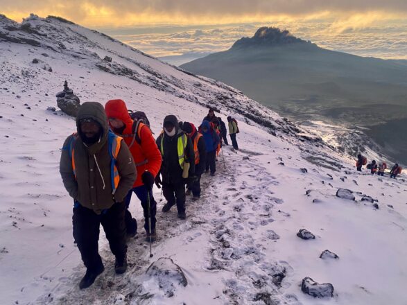 Simon Birkby (OL93) climbed Mount Kilimanjaro with fellow trekkers, guides and medics. 